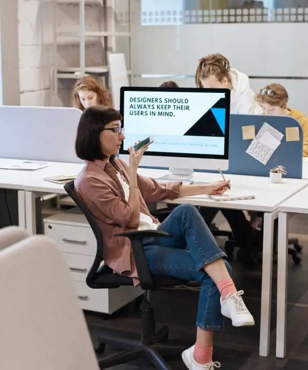 woman speaking on a cell phone talking about a design